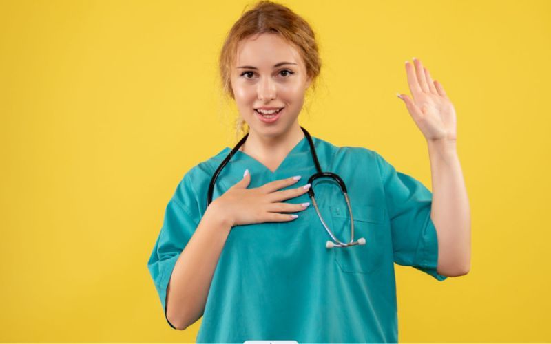 Adult care worker communicating via BSL.