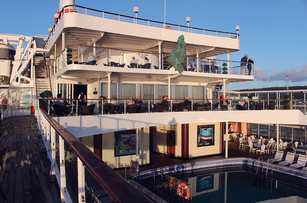 Boudicca’s bowsprit actually adorns the stern, mounted on the rails of the Bridge Deck—an ideal vantage point for people and seascape watching.  Via: Dana Huntley